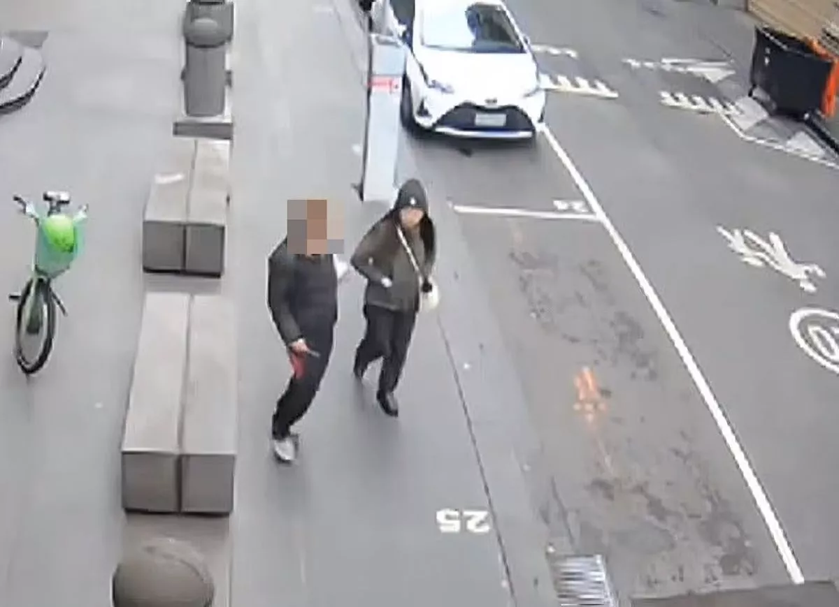 Horror moment woman is stabbed in the chest by stranger while she walks to work (video)