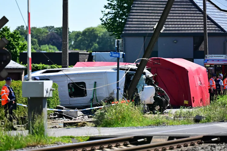 Four de@d as train hits Belgium school bus