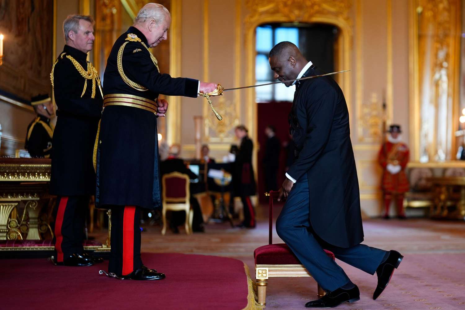 Idris Elba knighted by King Charles for anti-knife crime work (photos)