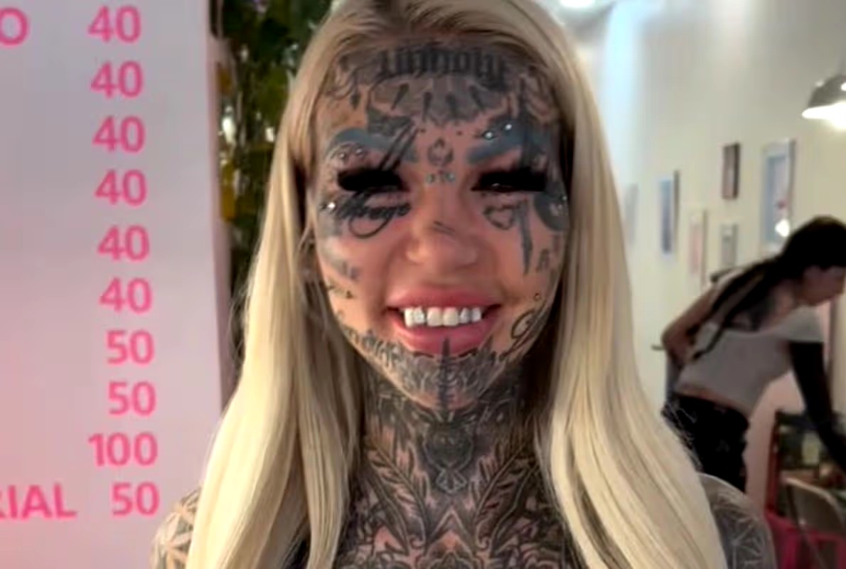 Most tattooed woman flies across the world for 