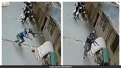 Dramatic moment man rushes to catch a child who fell from a second-floor window