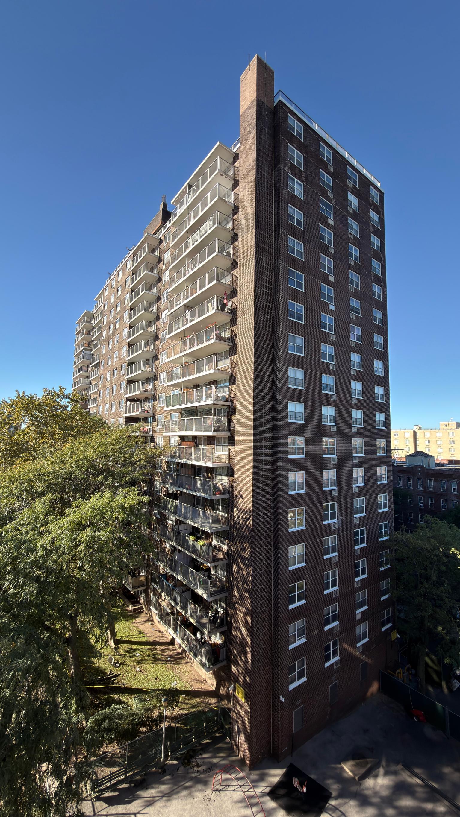 Man accused of pushing girlfriend and baby off NYC balcony smiles as he’s led away by cops