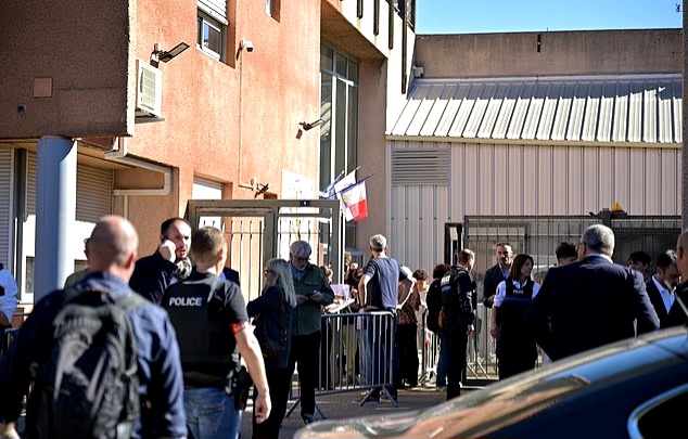 French schoolboy, 14, 'shoots headmaster and a teacher with shotgun after split from girlfriend'