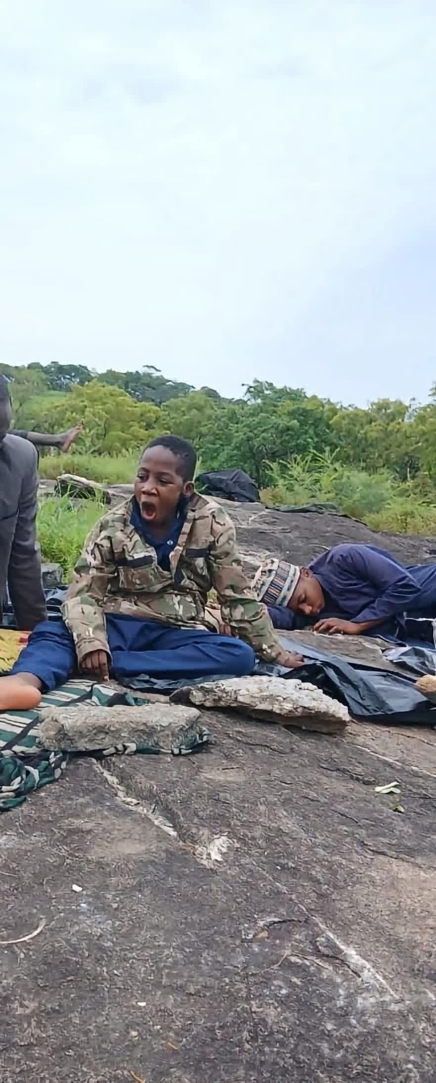 Mother begs for rescue of her two children abducted 7 weeks ago as she shares photo of them kidnappers sent