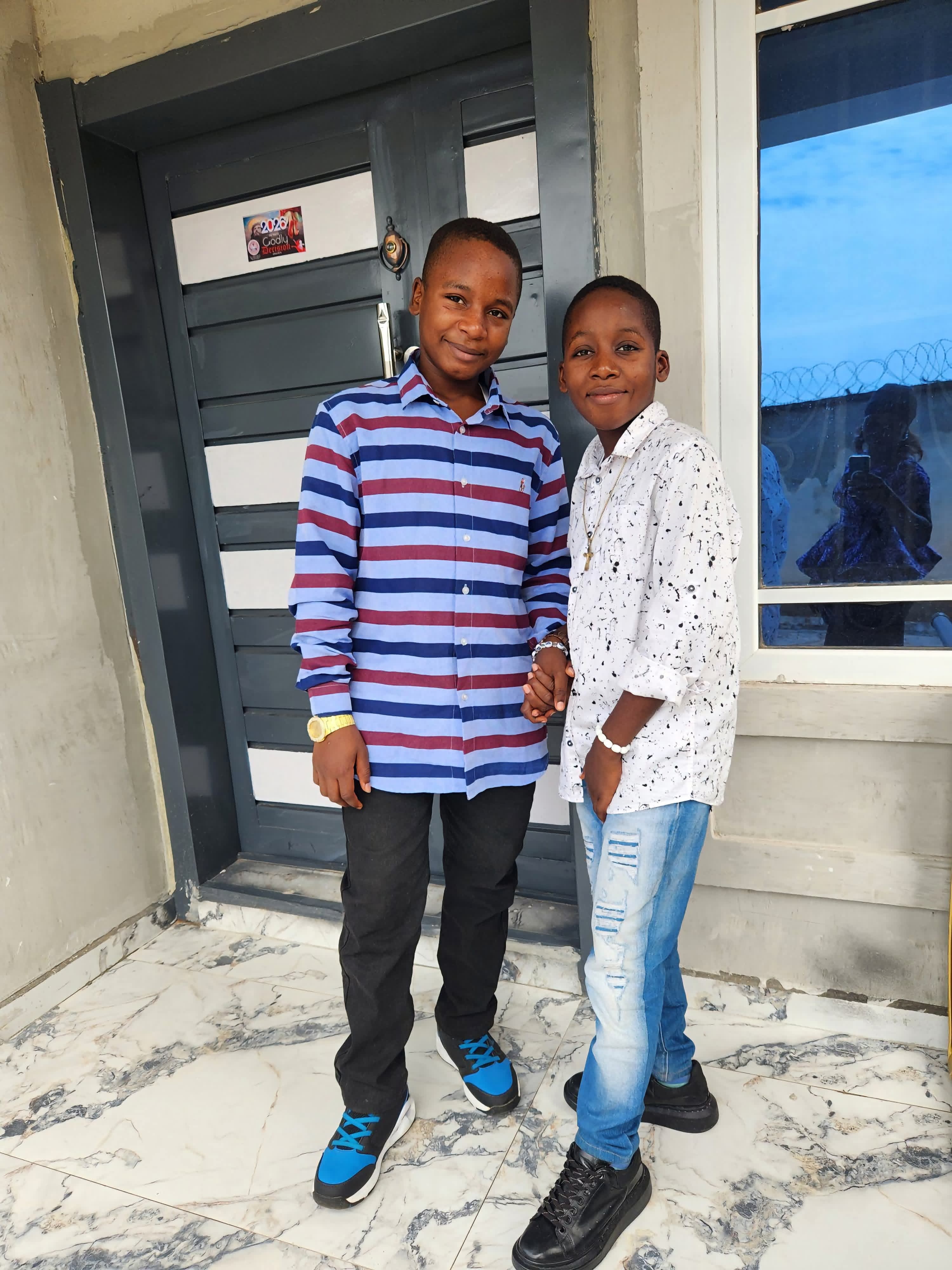 Mother begs for rescue of her two children abducted 7 weeks ago as she shares photo of them kidnappers sent