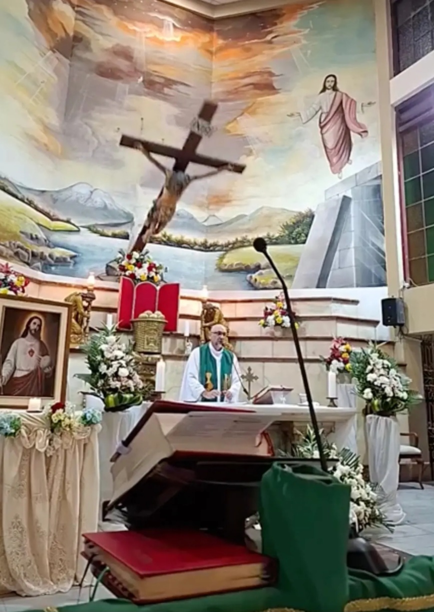 Priest who was slain on altar by falling crucifix was speaking to members about how fleeting life is