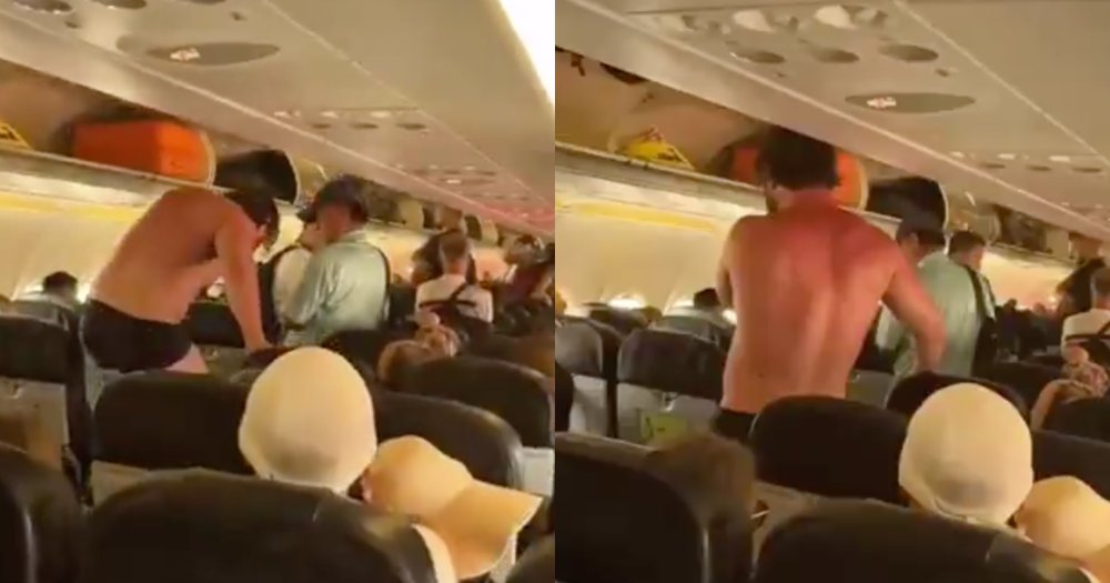 Drunk passenger ejected from flight after str!pping off clothes and attempting to jump off plane (video)