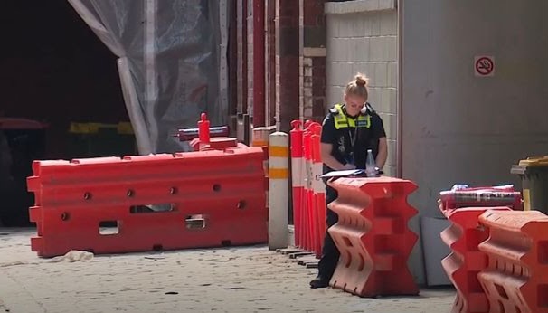 Male pedestrian crushed by woman who jumped off Melbourne building in suspected su!cide attempt