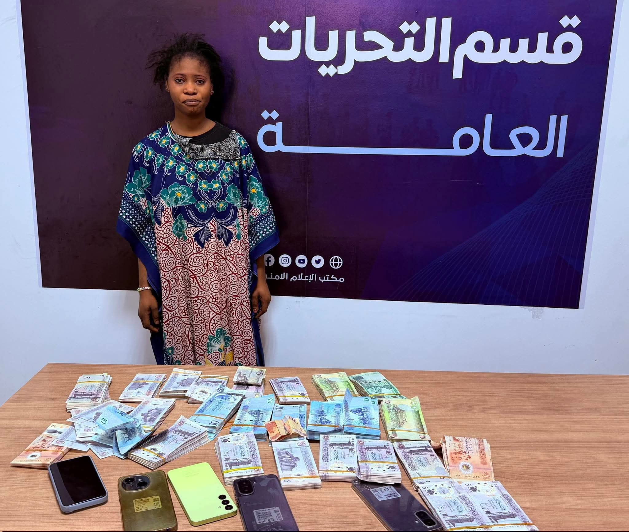 Nigerian housekeeper arrested for allegedly stealing money from her employer in Libya (photos)