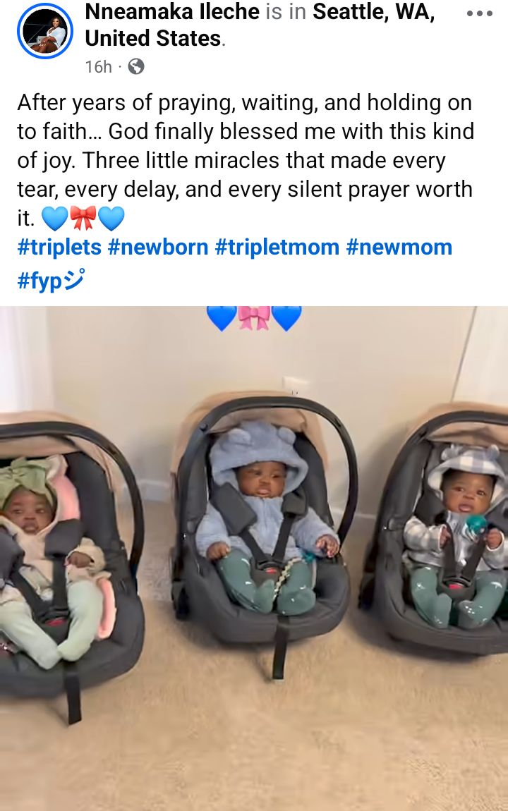 Joyful mother dancing with triplets