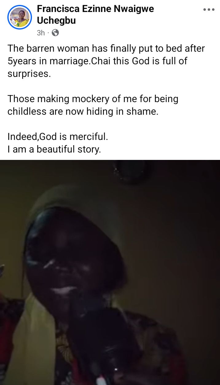 Family embracing their newborn