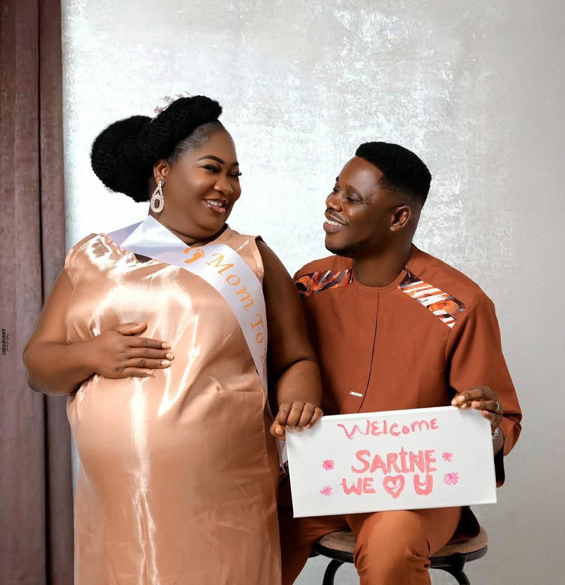 Pastor and his wife celebrate as they welcome first child after 14 years of waiting