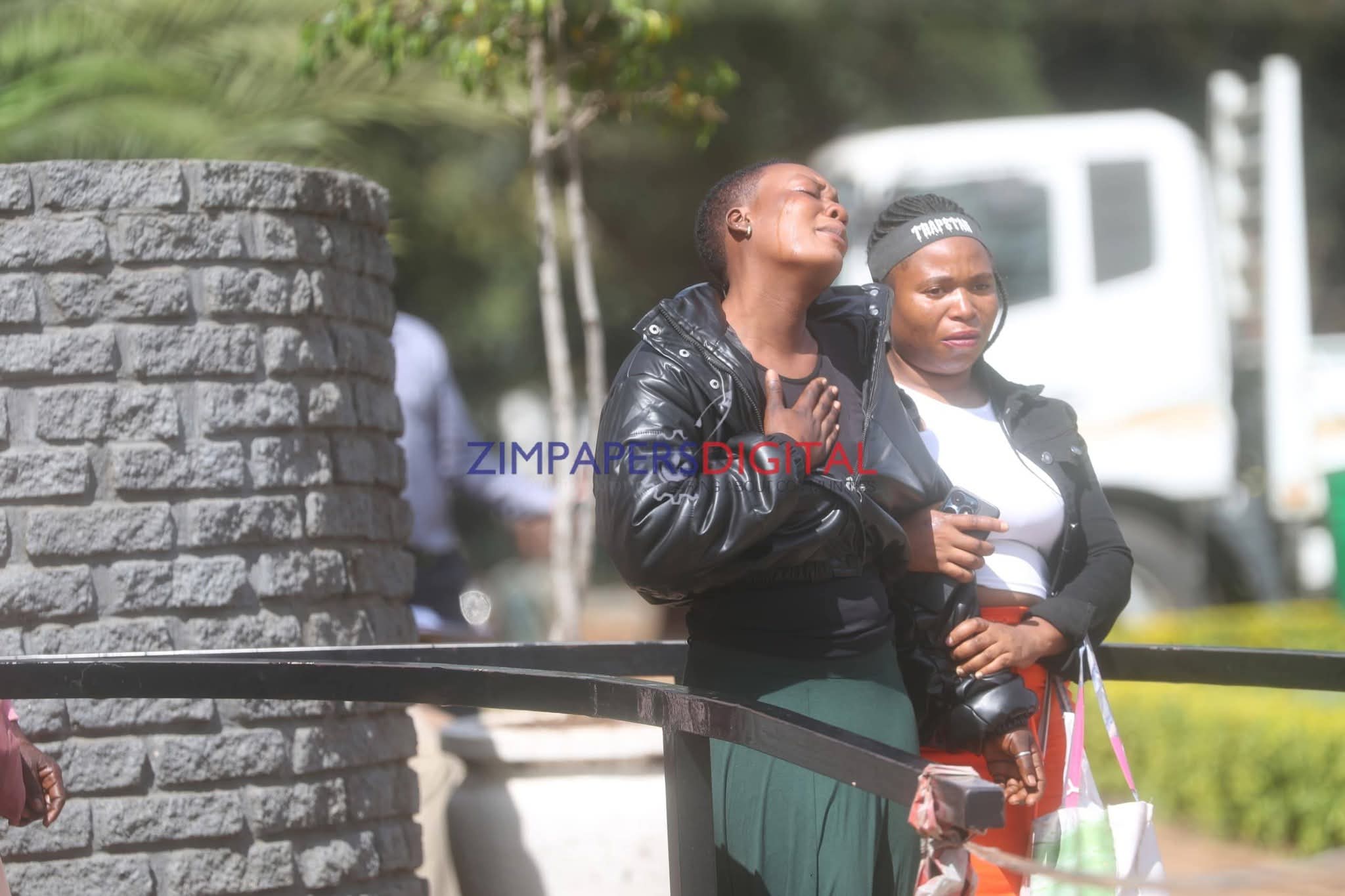 Wife of a suspected thief "Lucky Dube" breaks down in tears outside court after he was denied bail