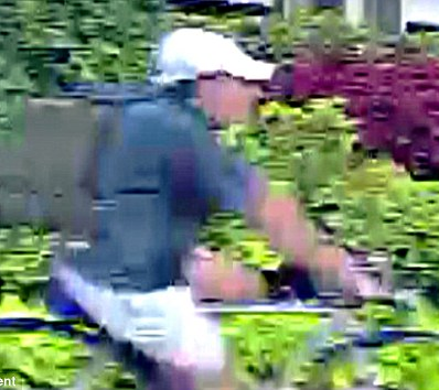 New images show George H.W. Bush's cardiologist being followed by cyclist gunman just moments before he was shot dead on his way to work