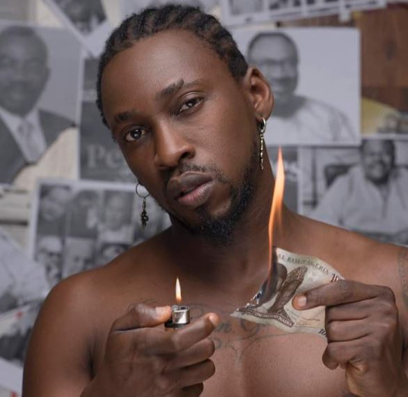 Orezi burns Nigerian currency in new photo