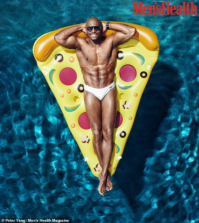 Terry Crews shows off his impressive massive muscles as he covers Men's Health magazine (Photos)