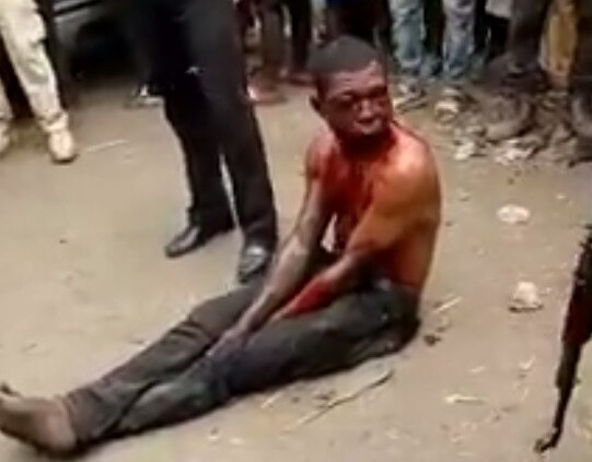 Photos/Videos: Notorious car thief nabbed and brutally beaten by irate mob in Abuja