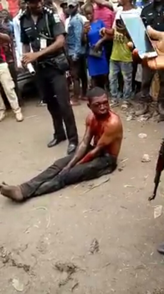 Photos/Videos: Notorious car thief nabbed and brutally beaten by irate mob in Abuja