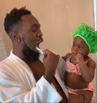 Beautiful video of Patoranking and his daughter brushing together