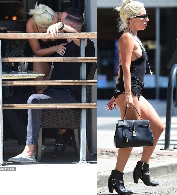 Lady Gaga locks lips with her 'new man' in public five-months after splitting from fiancé Christian Carino (Photos)
