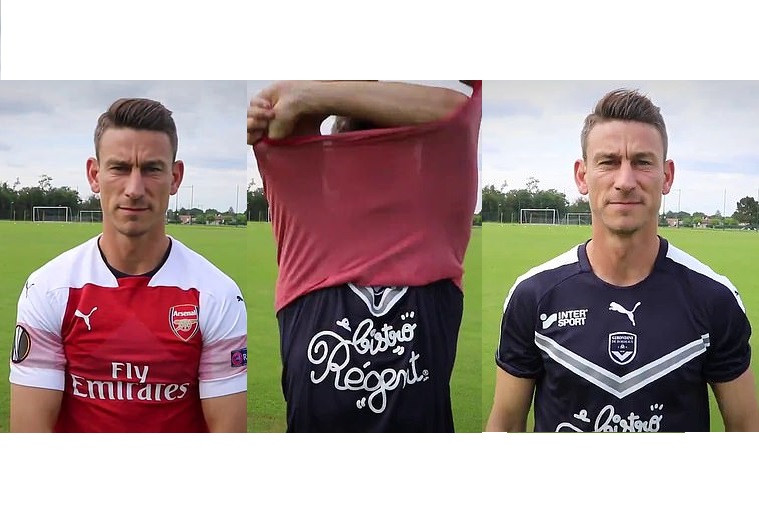 Ex-Arsenal captain Koscielny disrespects club by taking off red shirt to reveal Bordeaux jersey during his unveiling (Video)