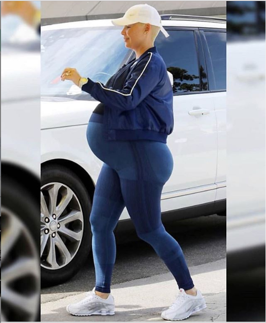 Heavily pregnant Amber Rose showcases her very large bump in new photo