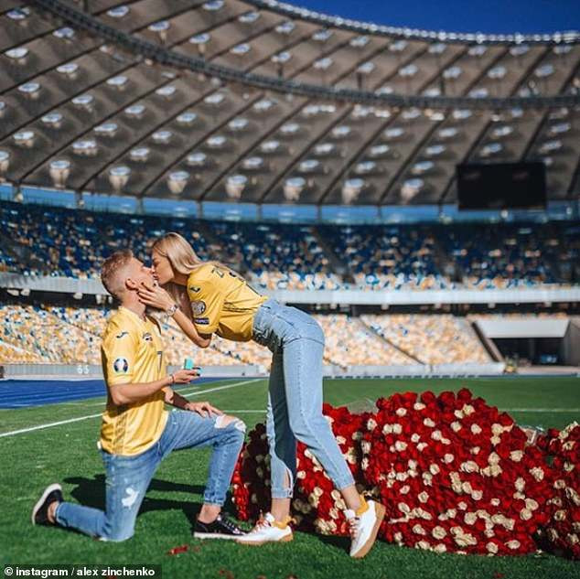 Manchester City star Zinchenko proposes to his stunning TV presenter girlfriend at Ukraine's national stadium (Photos)