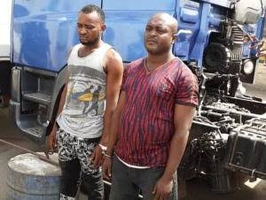 2 men in military camouflage for hijacking petrol tanker in Lagos lindaikejisblog 1