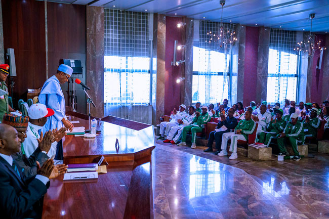 Buhari lights 'torch of unity' for National Sports Festival lindakejisblog 1
