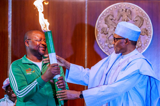 Buhari lights 'torch of unity' for National Sports Festival lindakejisblog 3