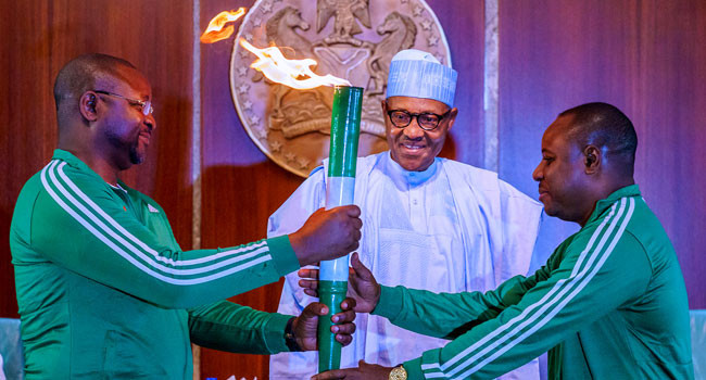 Buhari lights 'torch of unity' for National Sports Festival lindakejisblog 5