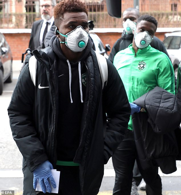 Coronavirus: Football team wears protective face masks and gloves as they arrive in Milan for Europa League match with Inter (photos)