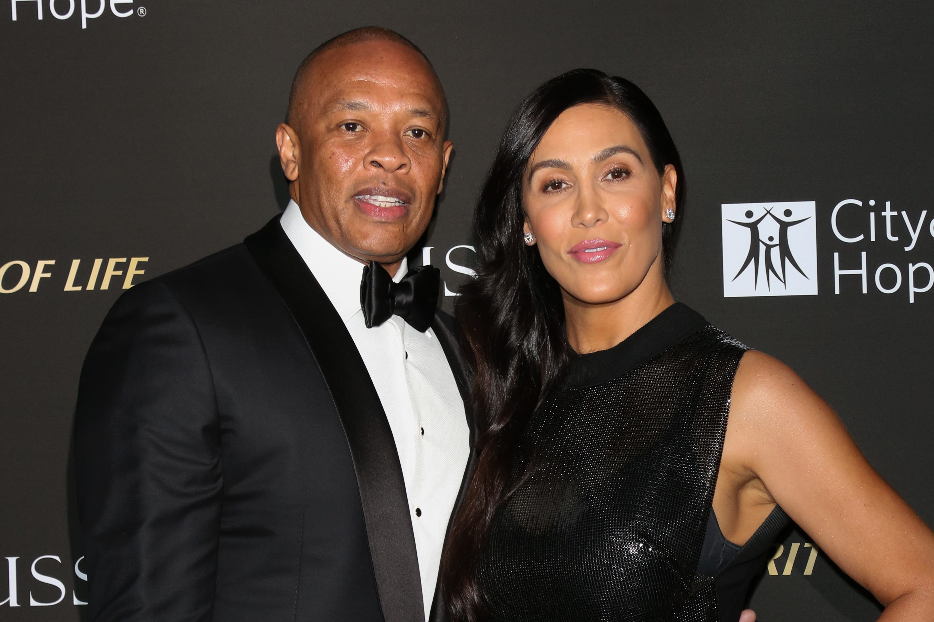 Dr Dre's estranged wife Nicole Young officially under investigation for embezzling more than $385k from rapper's business account amid couple's $1billion divorce