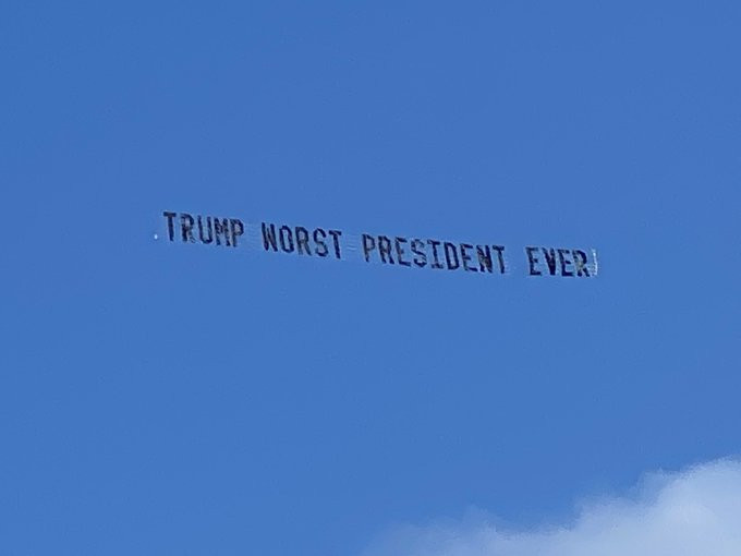 Plane carrying 'Worst President Ever' and 'Pathetic Loser' banner fly over Donald Trump's home (video)