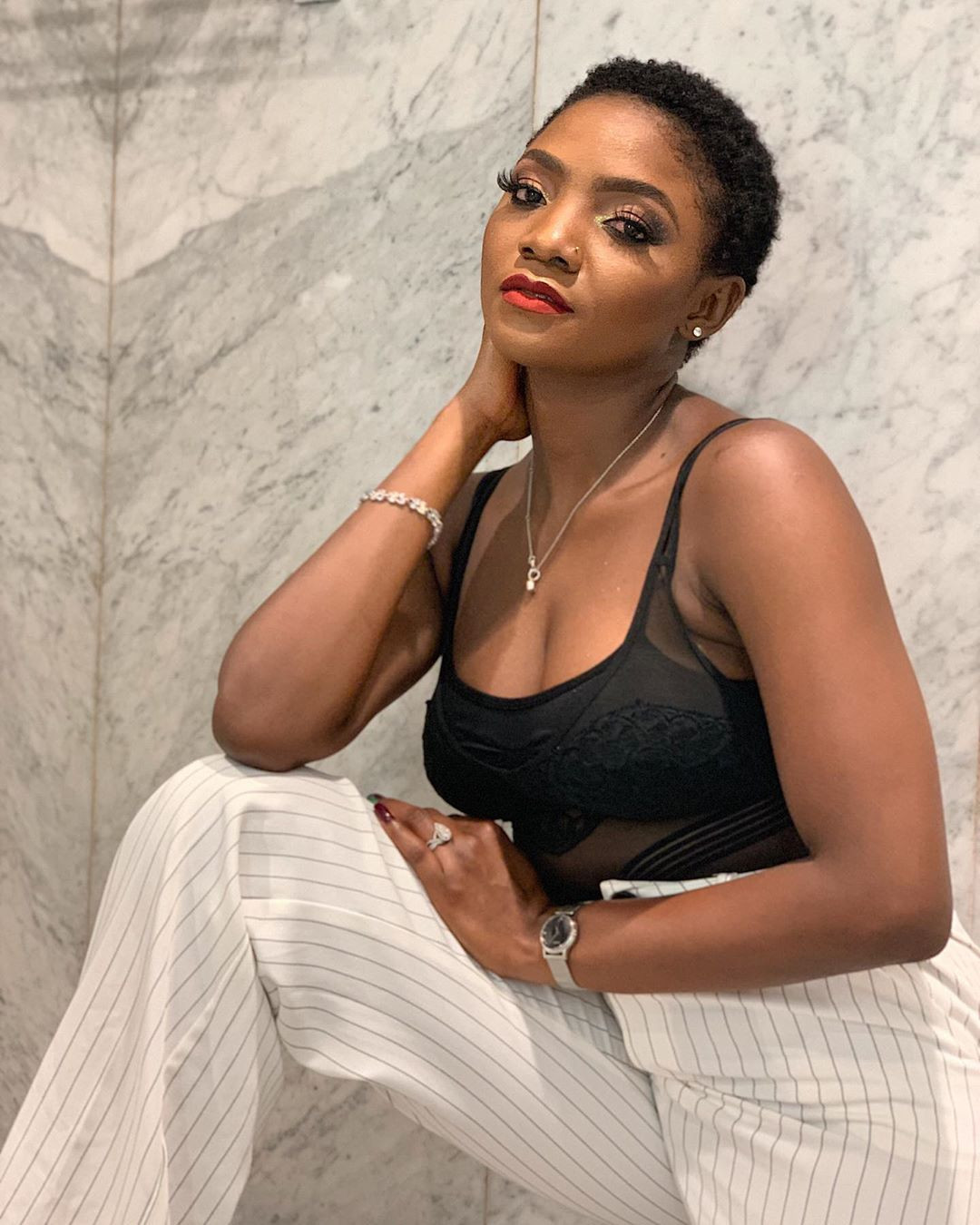 If you shame people for doing honest hard work to eat you are dumb - Simi 