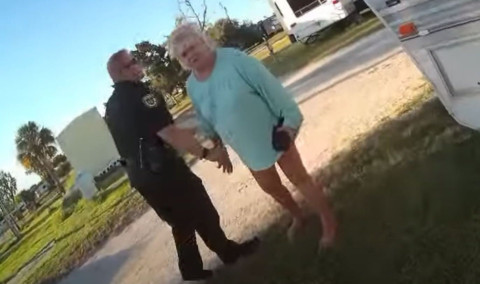 Woman arrested after allegedly throwing a caged cat in river during ...