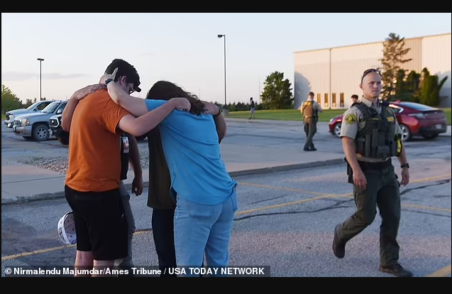 Gunman opens fire in Iowa church parking lot killing two young women and himself