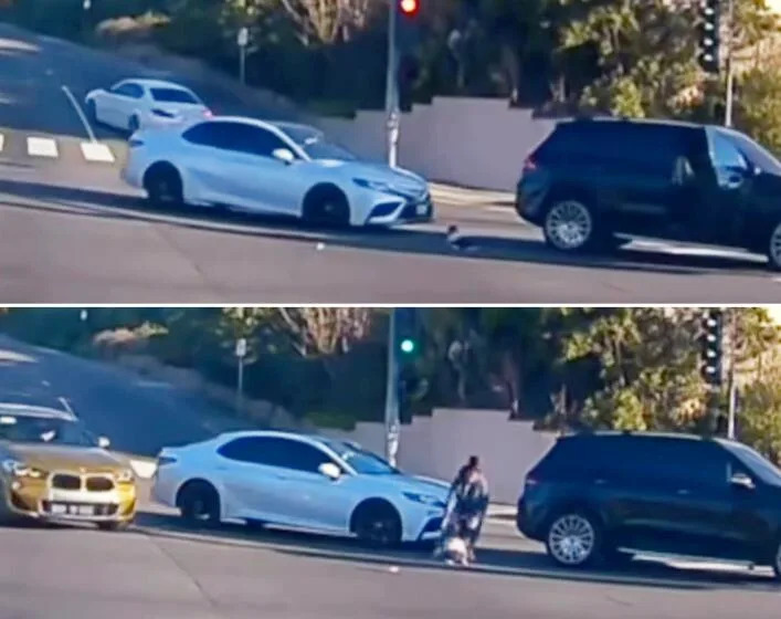 Mother arrested as shocking video shows toddler flying out of moving car in busy intersection (video)
