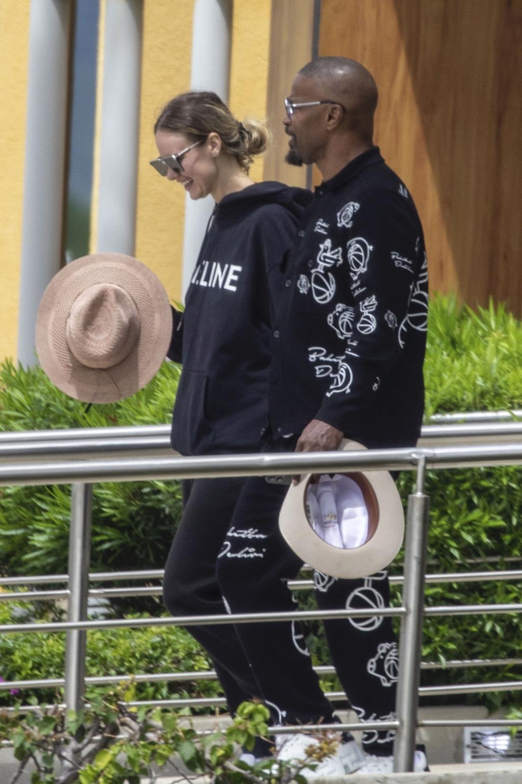 Jamie Foxx holds hands with girlfriend during vacation months after health scare (photos)