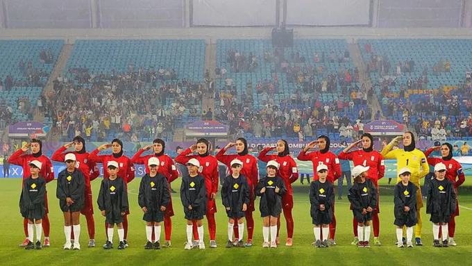 Womenâs football team to be welcomed home with open arms - Iran says after 5 playersÂ applied for asylum in Australia