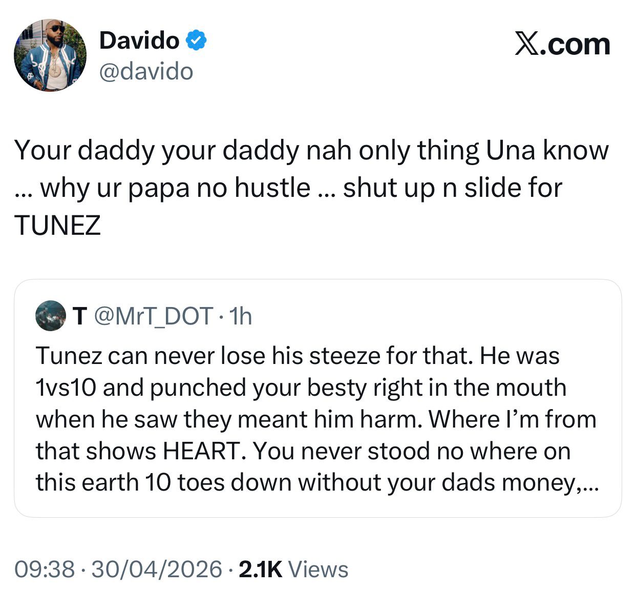 Singer Davido slams fan who dragged him while defending DJ Tunez
