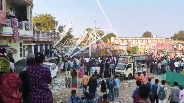 Moment fairground swing filled with schoolchildren collapses and injures 14