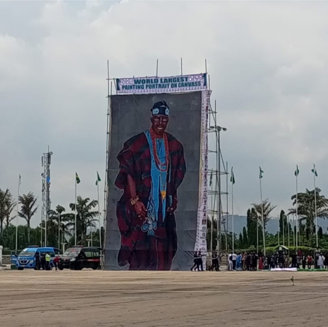 Large portrait of Tinubu, said to be the world’s largest painting portrait on canvas, is unveiled; Nigerians react..