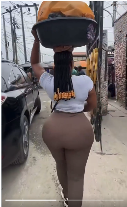 Lady with big b%mb%m decides to hawk pure water and drinks to see how fast she will sell all of them (video)