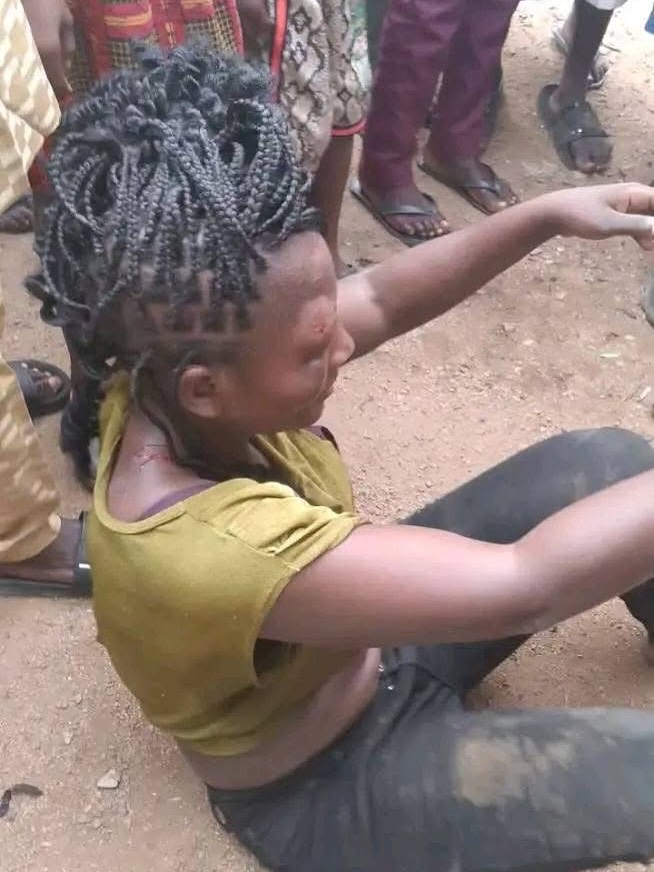 Angry mob b3ats young woman accused of stealing 2-year-old child in FCT
