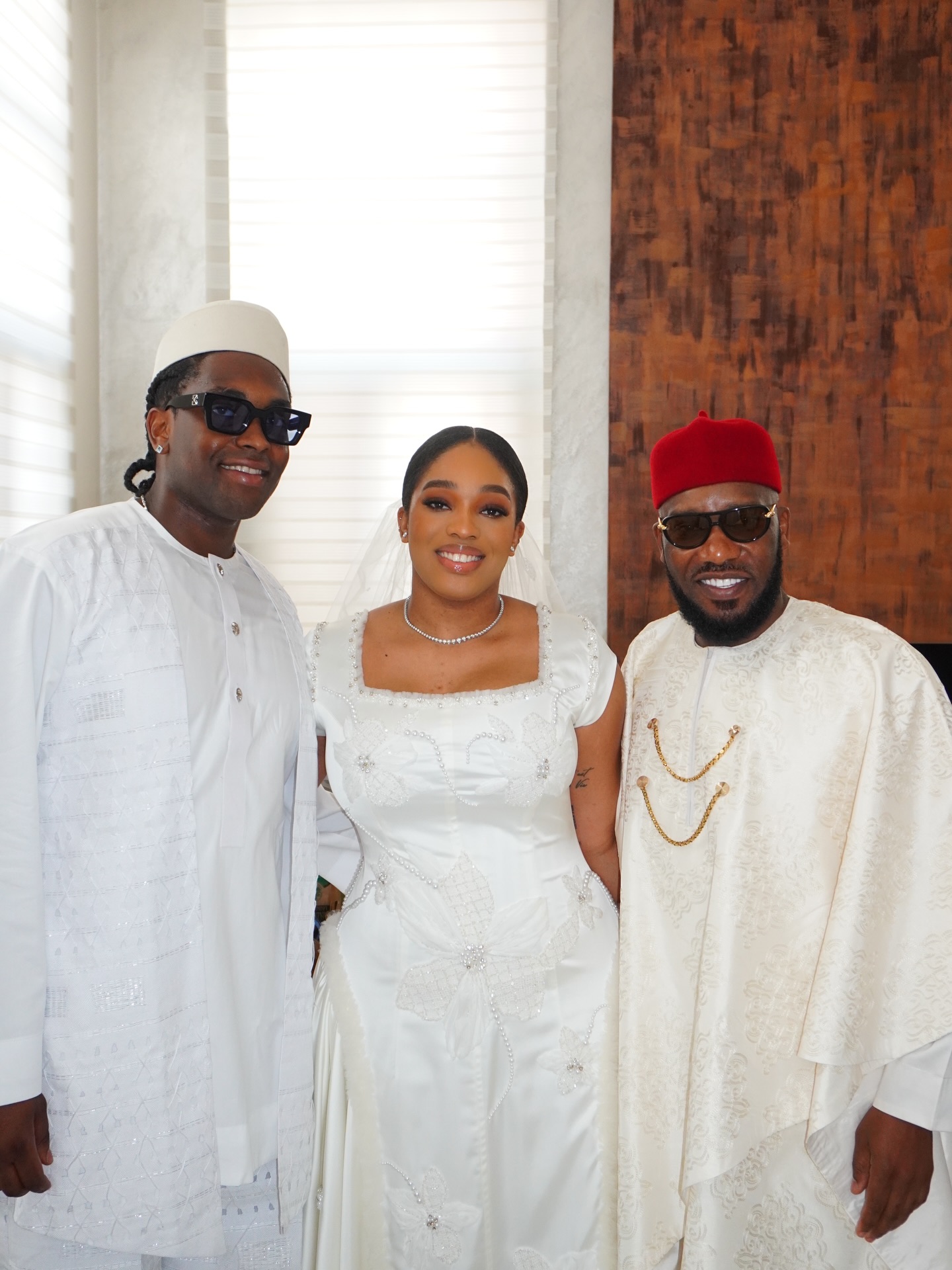 Photos of Jay Jay Okocha and wife, Nkechi at daughter