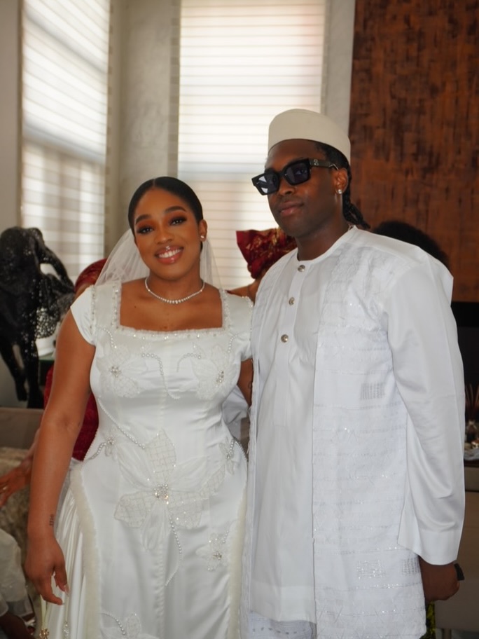 Photos of Jay Jay Okocha and wife, Nkechi at daughter