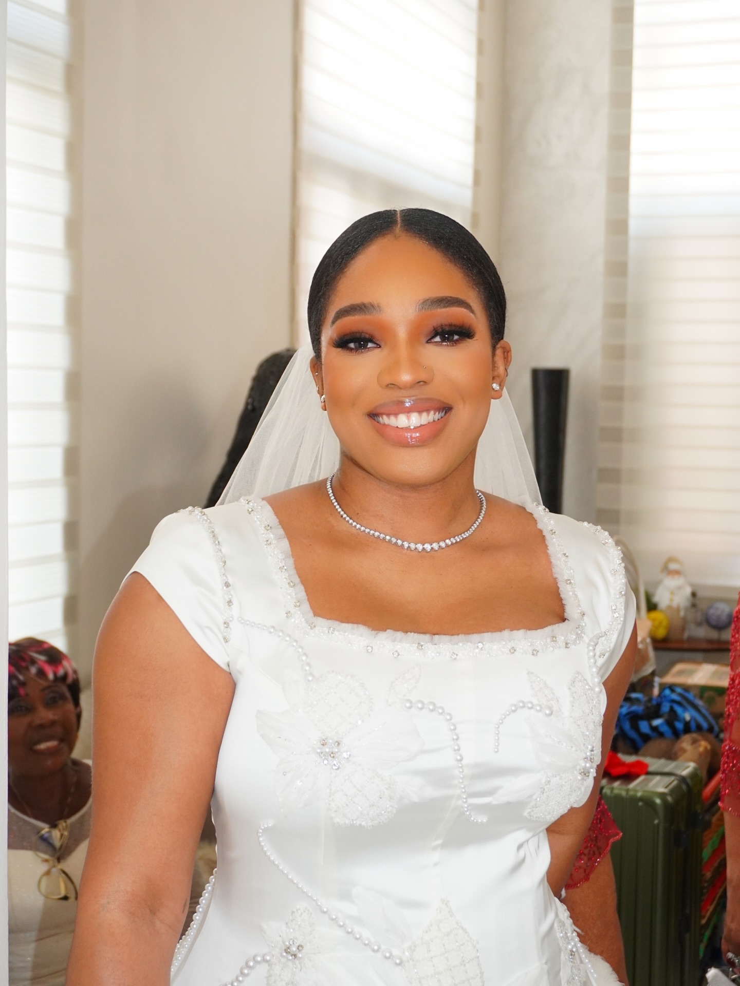 Photos of Jay Jay Okocha and wife, Nkechi at daughter