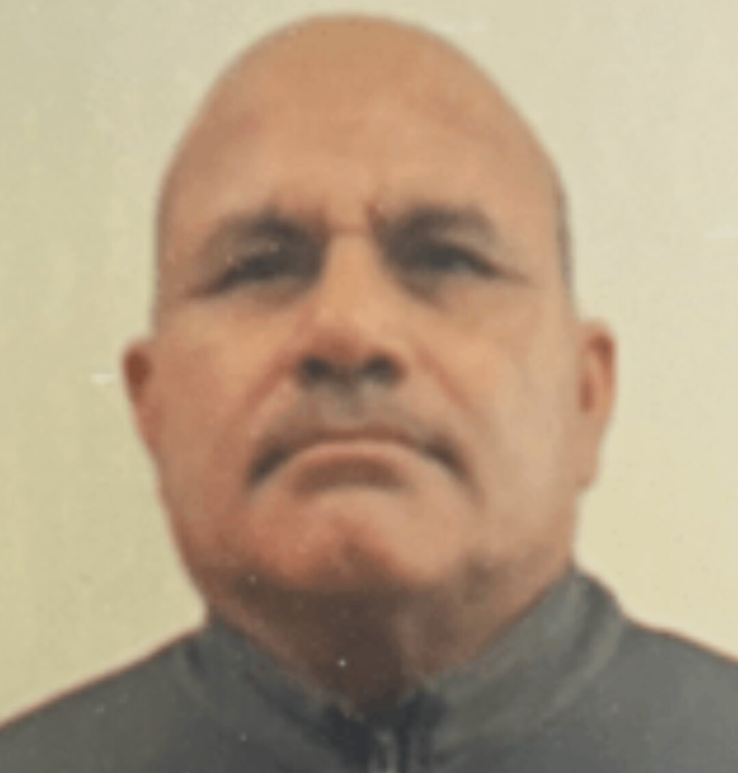 Dad shot by police while butchering his wife and daughter with curved dagger