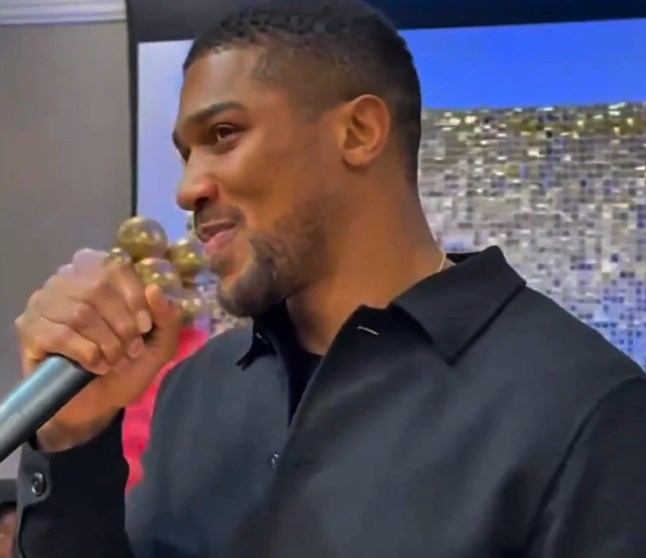 Joshua dancing with families during the Mother's Day celebration